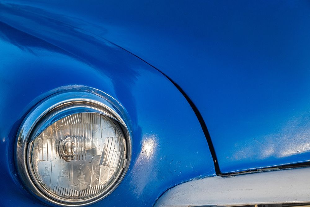 Detail of front end headlight on a classic blue American car in Vieja-old Habana-Havana-Cuba